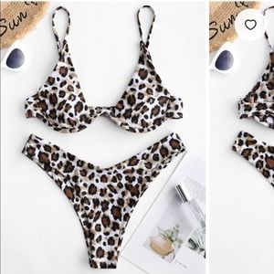 Two piece leopard print swimsuit set.